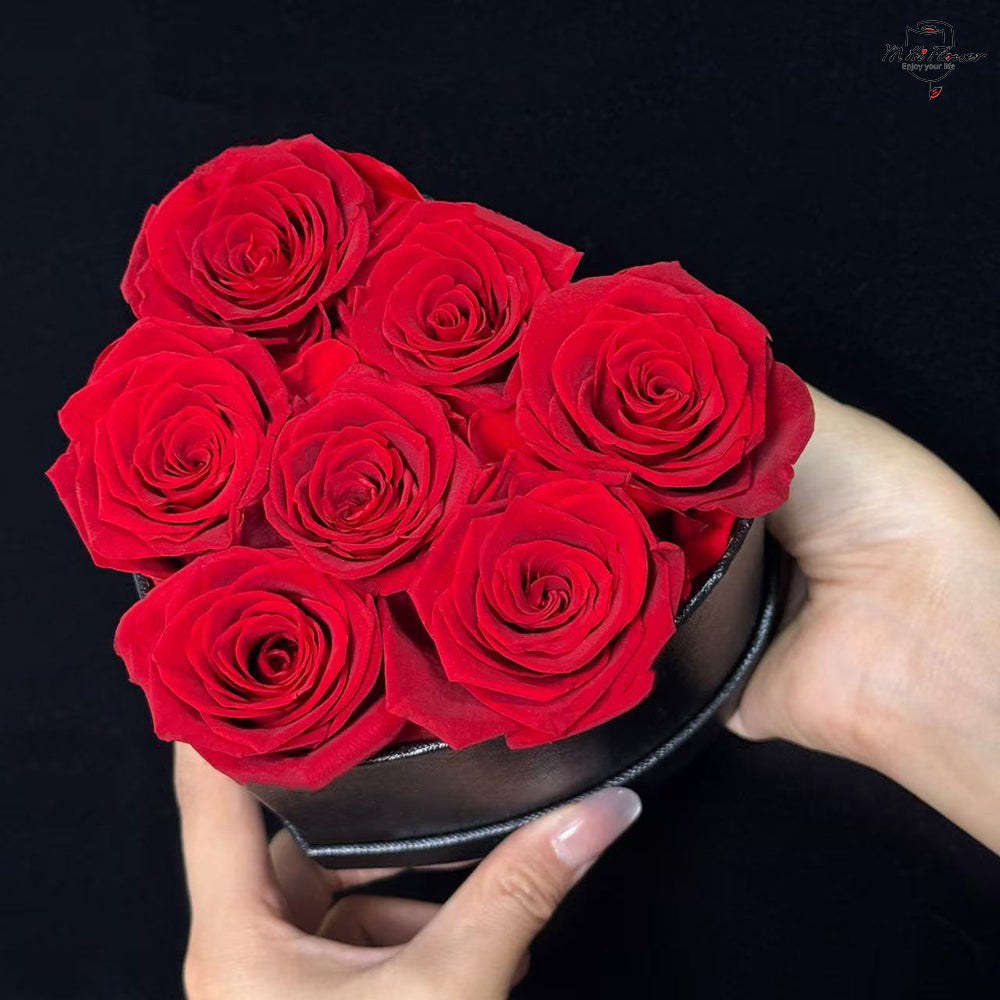 7pc red preserved rose in black heart box
