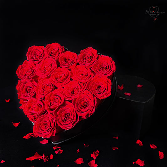 18pc red preserved rose in black heart box